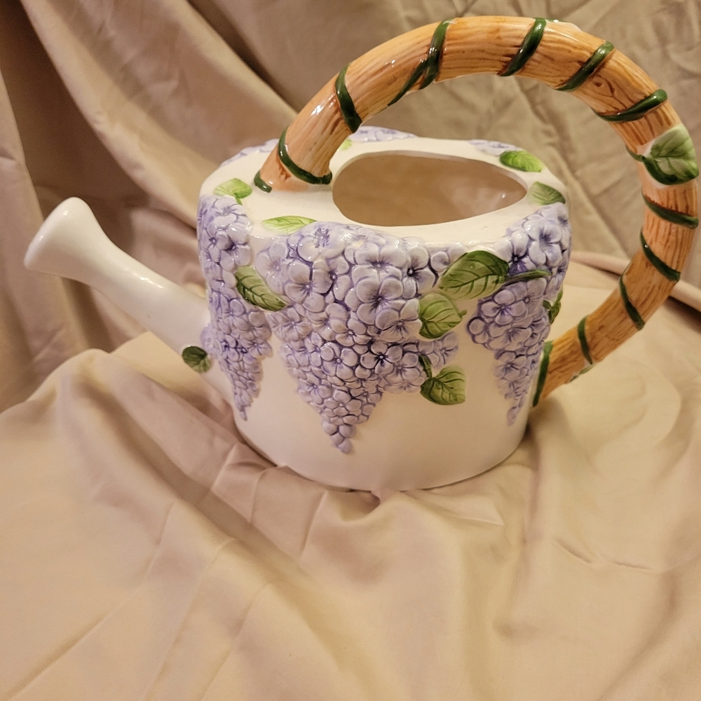 Ceramic watering can